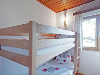 Ein Bett oder Betten in einem Zimmer der Unterkunft Chalet Monika