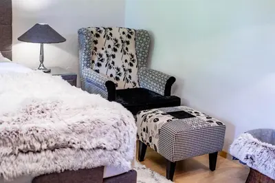 Ein Bett oder Betten in einem Zimmer der Unterkunft Alpenrelax Haus Weidmannsheil wohnen im romantischen Forsthaus