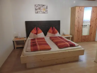 Ein Bett oder Betten in einem Zimmer der Unterkunft Kleinwidmoos-Apartment