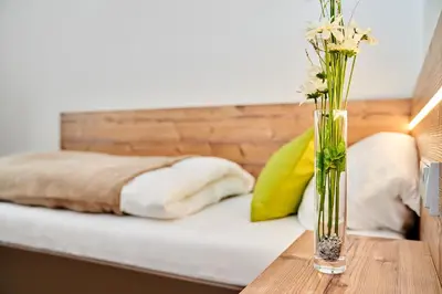 Ein Bett oder Betten in einem Zimmer der Unterkunft Huemer-Park Motel Vöcklatal
