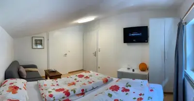 Ein Bett oder Betten in einem Zimmer der Unterkunft Apartment Sophia - Hallstatt