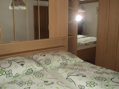 Ein Bett oder Betten in einem Zimmer der Unterkunft Gondelblick