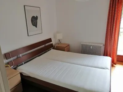 Ein Bett oder Betten in einem Zimmer der Unterkunft Zur sonnigen, eleganten Kuh