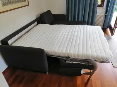 Ein Bett oder Betten in einem Zimmer der Unterkunft Zur sonnigen, eleganten Kuh