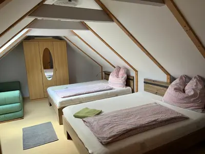 Ein Bett oder Betten in einem Zimmer der Unterkunft Ferienhaus Stolz