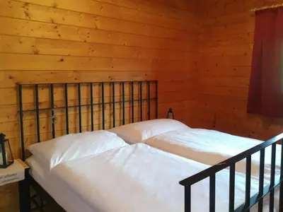 Ein Bett oder Betten in einem Zimmer der Unterkunft k&k Residenz