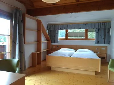 Ein Bett oder Betten in einem Zimmer der Unterkunft k&k Residenz