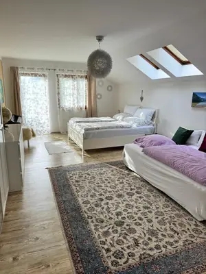 Ein Bett oder Betten in einem Zimmer der Unterkunft Haus Belli