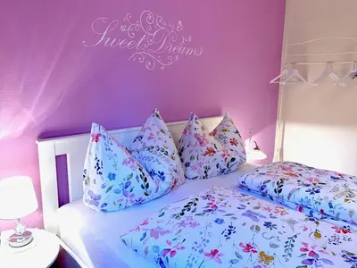 Ein Bett oder Betten in einem Zimmer der Unterkunft Haus Belli