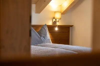 Ein Bett oder Betten in einem Zimmer der Unterkunft Zweimäderlhaus