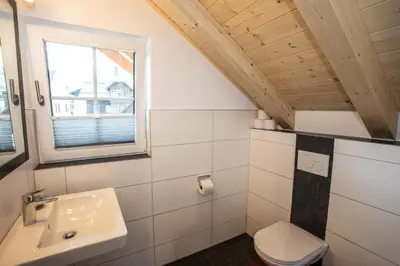 Ein Badezimmer in der Unterkunft Zweimäderlhaus