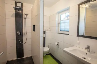 Ein Badezimmer in der Unterkunft Zweimäderlhaus
