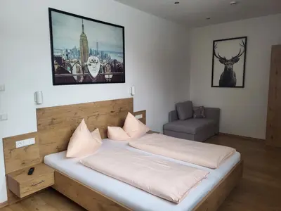 Ein Bett oder Betten in einem Zimmer der Unterkunft Haus Holzmann