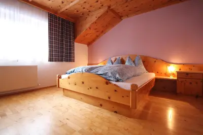 Ein Bett oder Betten in einem Zimmer der Unterkunft Reiteralm Living
