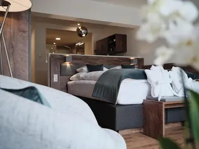 Ein Bett oder Betten in einem Zimmer der Unterkunft SEE Moment Appartements ADULTS ONLY