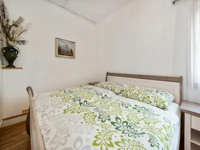Ein Bett oder Betten in einem Zimmer der Unterkunft Alpiner Familienurlaub in Bad Mitterndorf