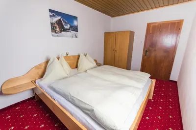 Ein Bett oder Betten in einem Zimmer der Unterkunft Appartements Grabenbauer