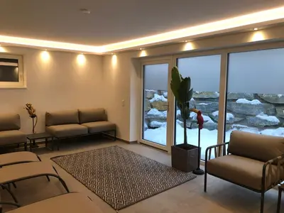 Ein Sitzbereich in der Unterkunft Kaminzimmer Suite
