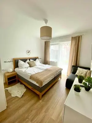 Ein Bett oder Betten in einem Zimmer der Unterkunft App. Seyrl im Haus Karoline