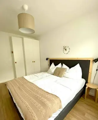 Ein Bett oder Betten in einem Zimmer der Unterkunft App. Seyrl im Haus Karoline