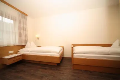 Ein Bett oder Betten in einem Zimmer der Unterkunft Appartement Kristall