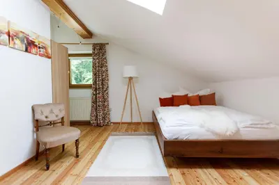 Ein Bett oder Betten in einem Zimmer der Unterkunft Ferienwohnung am Bründlweg