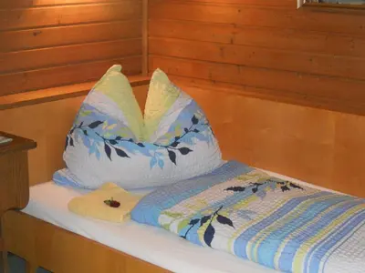 Ein Bett oder Betten in einem Zimmer der Unterkunft Haus zur Linde