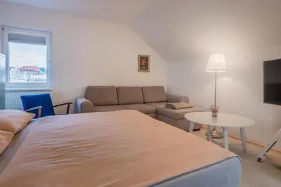 Ein Bett oder Betten in einem Zimmer der Unterkunft Rooftop Apartment, Exclusive City and Mountain View