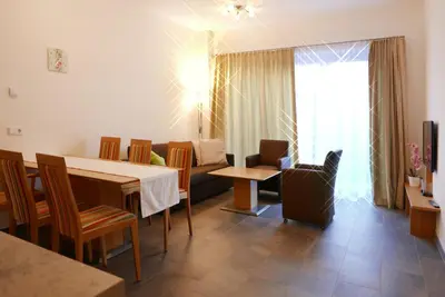 Ein Sitzbereich in der Unterkunft Deluxe Apartment SCHRABERGER