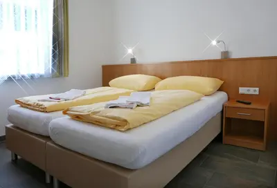 Ein Bett oder Betten in einem Zimmer der Unterkunft Deluxe Apartment SCHRABERGER