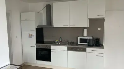 Küche/Küchenzeile in der Unterkunft Danner Familien-Ferienwohnungen - Ruhige Lage, 650 m zum Attersee & zentral in Schörfling