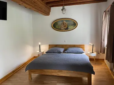 Ein Bett oder Betten in einem Zimmer der Unterkunft Apartment in Historic Town House