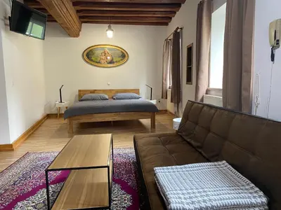 Ein Sitzbereich in der Unterkunft Apartment in Historic Town House