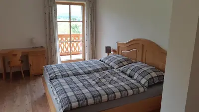 Ein Bett oder Betten in einem Zimmer der Unterkunft Landhaus Wolfgang