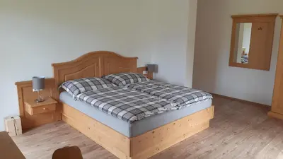 Ein Bett oder Betten in einem Zimmer der Unterkunft Landhaus Wolfgang