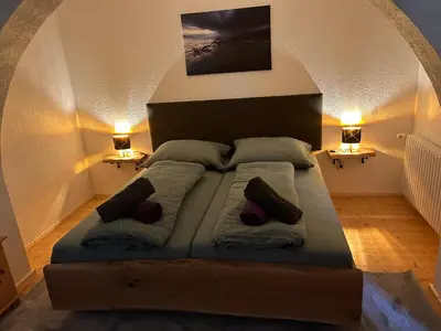 Ein Bett oder Betten in einem Zimmer der Unterkunft Ferienwohnung Mariana