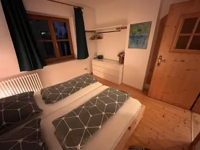 Ein Bett oder Betten in einem Zimmer der Unterkunft Ferienwohnung Mariana