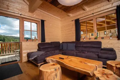 Ein Sitzbereich in der Unterkunft Chalet Risus Vallis Lachtal
