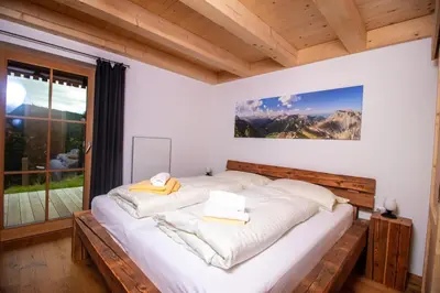 Ein Bett oder Betten in einem Zimmer der Unterkunft Chalet Risus Vallis Lachtal
