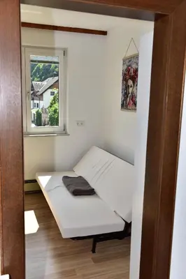Ein Bett oder Betten in einem Zimmer der Unterkunft Ferienwohnung Isabell