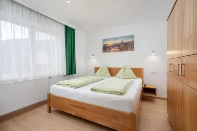 Ein Bett oder Betten in einem Zimmer der Unterkunft Apartments Frauenschuh