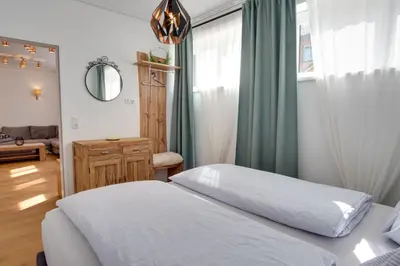 Ein Bett oder Betten in einem Zimmer der Unterkunft Ferienwohnung Angerer