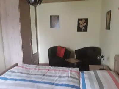 Ein Bett oder Betten in einem Zimmer der Unterkunft Bianca's Ferienwohnung