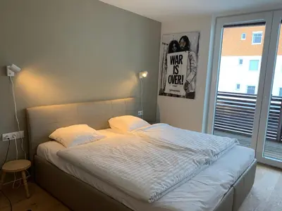 Ein Bett oder Betten in einem Zimmer der Unterkunft Alpenlodge Haus im Ennstal