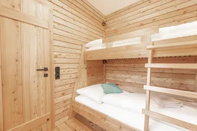 Ein Bett oder Betten in einem Zimmer der Unterkunft Ferienhaus Spitzenhof - Urlaub am Bauernhof