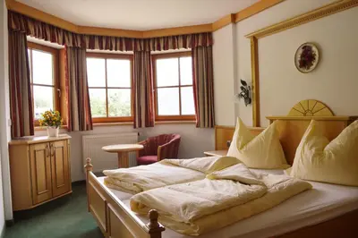 Ein Bett oder Betten in einem Zimmer der Unterkunft Appartement Sonnseitn