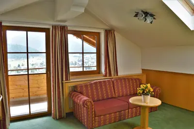 Ein Sitzbereich in der Unterkunft Appartement Sonnseitn