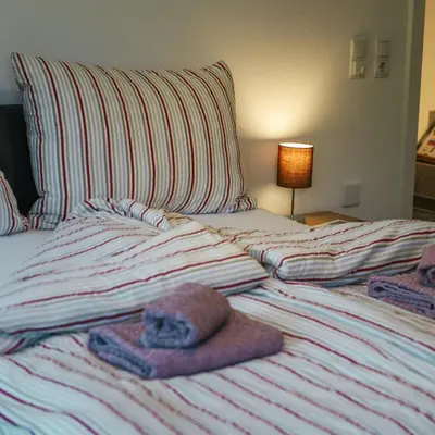 Ein Bett oder Betten in einem Zimmer der Unterkunft Siegi's Apartments