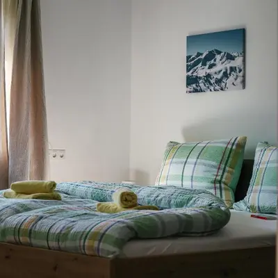 Ein Bett oder Betten in einem Zimmer der Unterkunft Siegi's Apartments