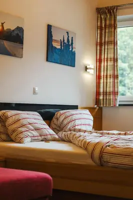 Ein Bett oder Betten in einem Zimmer der Unterkunft Siegi's Apartments